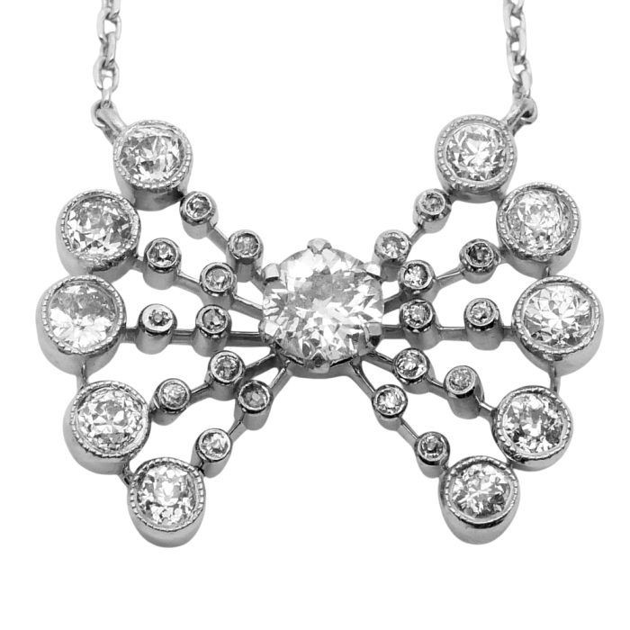 Antique Diamond Platinum Bow Pendant